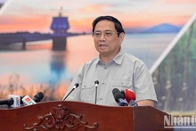 El primer ministro Pham Minh Chinh habla en la reunión. (Fotografía: Nhan Dan)