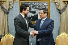 El primer ministro de Vietnam, Pham Minh Chinh, y el príncipe heredero de Jordania, Al Hussein bin Abdullah II. (Fotografía: VNA)