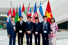 Los cuatro representantes de Vietnam en la IBO 2024. (Fotografía: Nhan Dan)