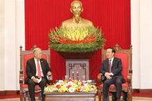 Escena de la reunión entre el miembro del Buró Político y permanente del Secretariado del Comité Central del Partido Comunista de Vietnam, Vo Van Thuong, y el secretario general del Partido del Trabajo de México, Alberto Anaya Guitiérrez. (Fotografía: VNA)