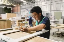 Producción de muebles en la empresa de Manh He, en Ciudad Ho Chi Minh. (Fotografía: VNA)