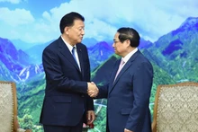 [Foto] Premier vietnamita se reúne con ministro japonés encargado del CPTPP