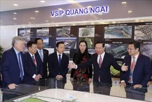 El presidente de Vietnam, Vo Van Thuong (segundo a la derecha), en la exposición de la ceremonia. (Fotografía: VNA)