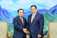 [Foto] Premier vietnamita recibe a jefe de la Autoridad Estatal de Inspección laosiana