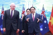 El primer ministro de Vietnam, Pham Minh Chinh, y el gobernador general de Australia, David Hurley. (Fotografía: VNA)