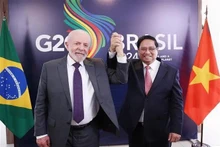 El primer ministro de Vietnam, Pham Minh Chinh, y el presidente de Brasil, Luiz Inácio Lula da Silva. (Fotografía: VNA)