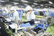 Línea de producción de impresoras en Canon Vietnam, una de las empresas con capital de inversión de Japón. (Fotografía: hanoimoi.com.vn)