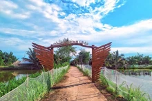 Una puerta a Con Chim, un islote ubicado en el distrito de Chau Thanh, provincia sureña de Tra Vinh. (Fotografía: thamhiemmekong.com)