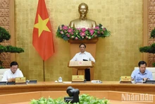 [Foto] Premier vietnamita preside reunión gubernamental sobre formulación de leyes