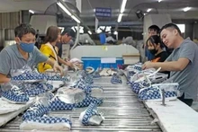 Producción de calzado para exportación a la Unión Europea. (Fotografía: VNA)