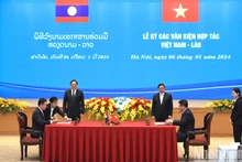 [Foto] Premieres de Vietnam y Laos presencia firma de documentos de cooperación