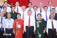 El secretario general del Partido Comunista de Vietnam, To Lam, y delegados. (Fotografía: VNA)