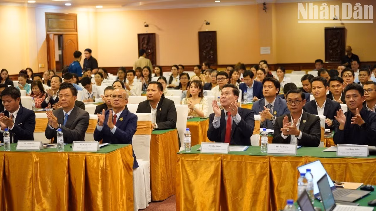 Asistentes al evento. (Foto: Nhan Dan)
