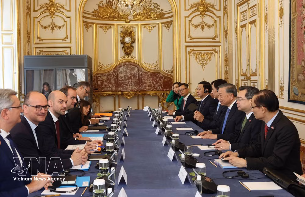 En la reunión. (Foto: VNA)