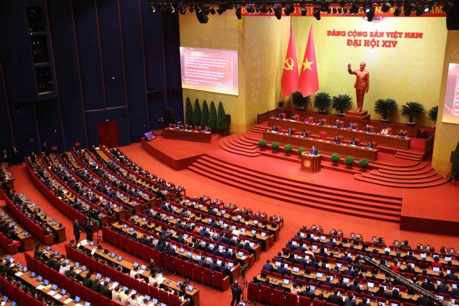 Durante la sesión inaugural del XIV Congreso Nacional del Partido Comunista de Vietnam. (Foto: VNA)