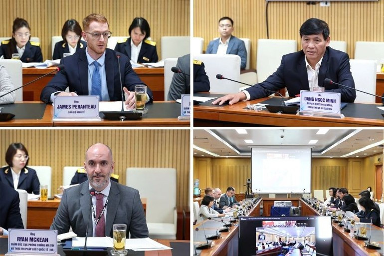 El subdirector del Departamento de Impuestos, Dang Ngoc Minh, y funcionarios de la embajada de EE.UU en Hanói intercambian información durante la reunión.