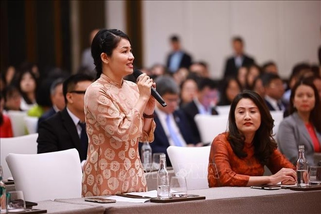 Representantes de los connacionales expresan su alegría por el desarrollo positivo de las relaciones entre Vietnam y China (Foto: VNA) Representantes de los connacionales expresan su alegría por el desarrollo positivo de las relaciones entre Vietnam y China (Foto: VNA)