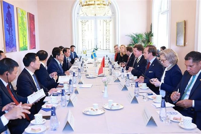 En la reunión. (Fuente: VNA) En la reunión. (Fuente: VNA)