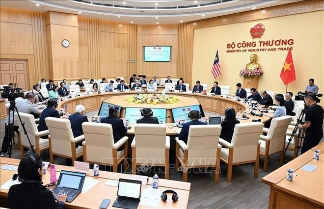 La cuarta reunión del Comité Comercial Mixto Vietnam-Malasia, celebrada en Hanói el 9 de julio de 2024 (Foto: VNA) La cuarta reunión del Comité Comercial Mixto Vietnam-Malasia, celebrada en Hanói el 9 de julio de 2024 (Foto: VNA)