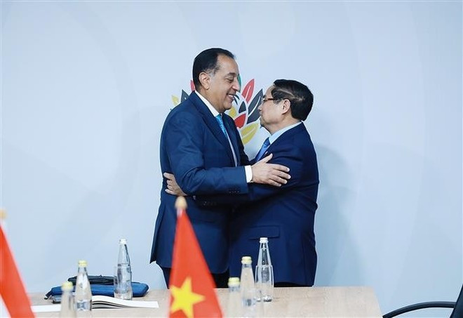 El primer ministro vietnamita, Pham Minh Chinh, y su homólogo egipcio, Mostafa Madbouly. (Foto: VNA)