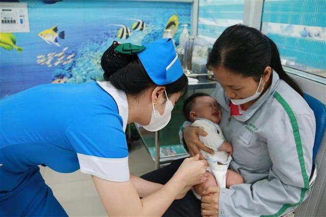 Vietnam ha logrado avances notables en su programa de inmunización infantil (Foto: VNA) Vietnam ha logrado avances notables en su programa de inmunización infantil (Foto: VNA)