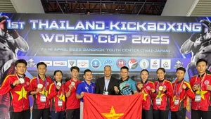 Atletas y entrenadores vietnamitas en el torneo (Foto: VNA)