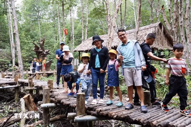 Turistas en Ciudad Ho Chi Minh. (Foto: VNA)