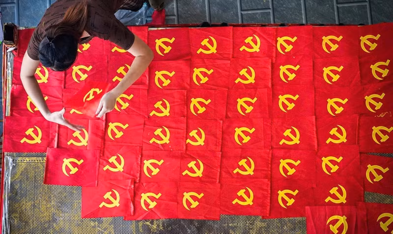 Cada etapa, cada bandera, es finalizada con gran esmero por los pobladores locales.( Foto: VNA)