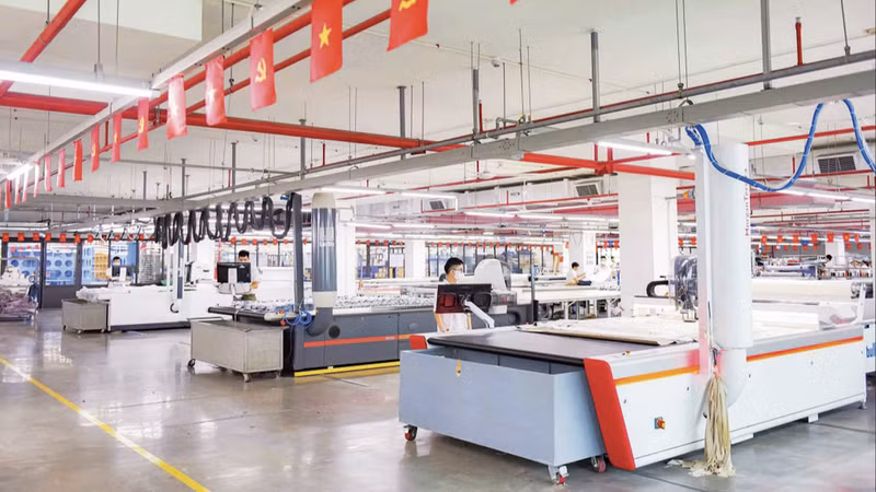 Máquina de corte automática programable en la industria textil y de la confección. (Foto: HOANG ANH)