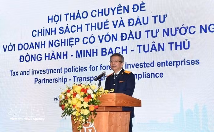 El director del Servicio de Impuestos, Mai Xuan Thanh, habla en la cita. (Foto: VNA)