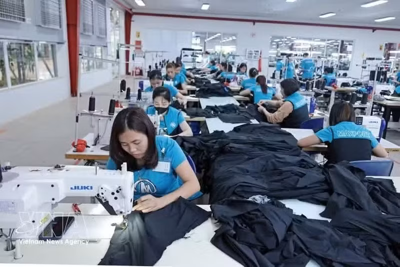 La maquinaria moderna mejora la productividad laboral. (Foto: VNA)