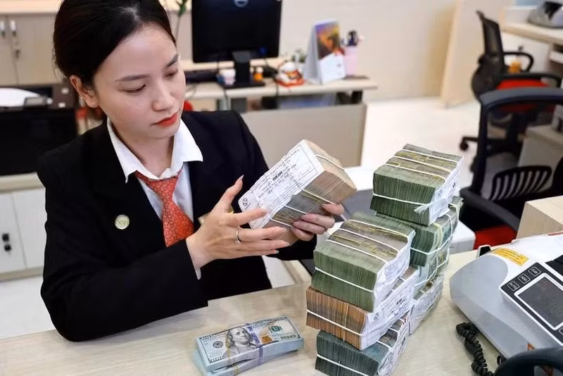 Los bancos están implementando diversas soluciones crediticias para apoyar a las empresas. (Foto: VNA)