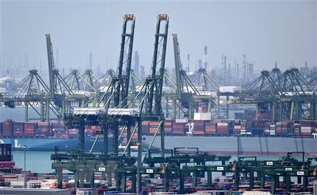 El transporte de carga en el puerto de Pasir Panjang enSingapur (Fotografía: VNA)