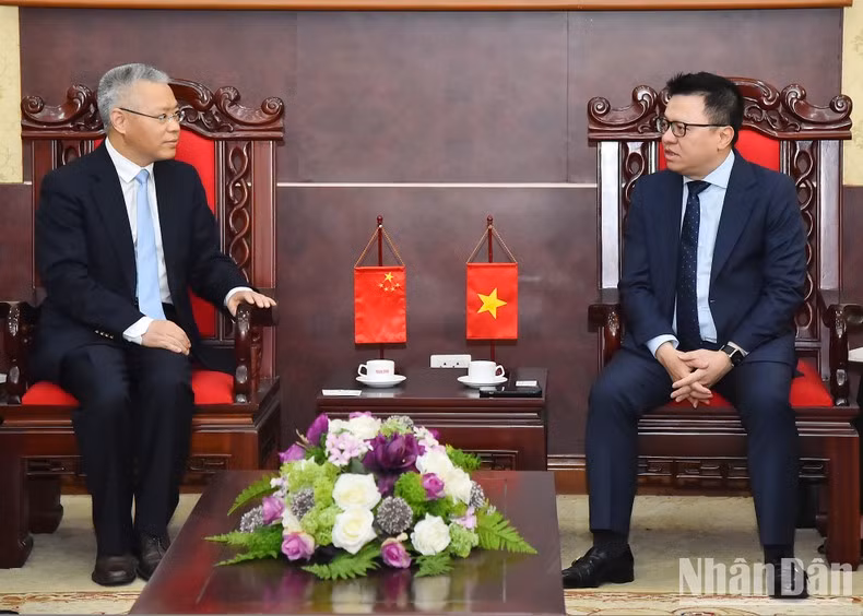 Quoc Minh y Hu Zhaoming en la recepción.