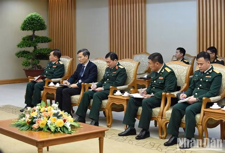 Los delegados vietnamitas asistentes en el encuentro.