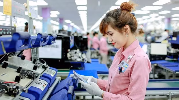 Fabricación de productos electrónicos en la fábrica de Samsung Electronics Vietnam, en la provincia de Thai Nguyen. (Foto: Nhan Dan)
