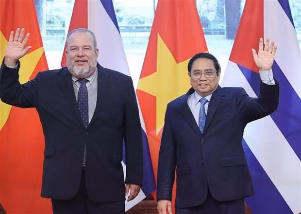 El primer ministro vietnamita, Pham Minh Chinh y su homólogo cubano, Manuel Marrero Cruz. (Fotografía: VNA)
