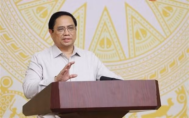 El primer ministro de Vietnam, Pham Minh Chinh, habla en la teleconferencia. (Fotografía: VNA)