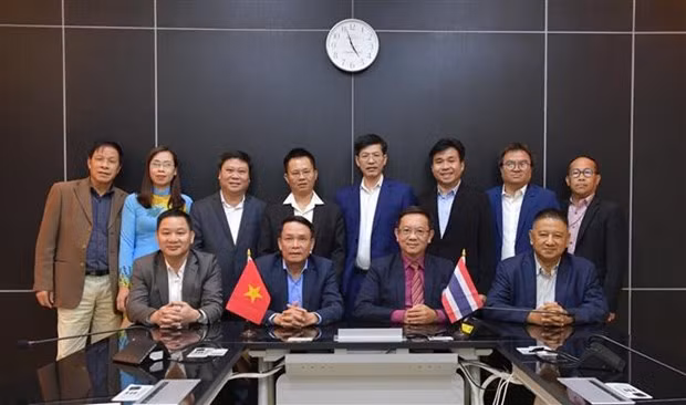 Representantes de las asociaciones de periodistas de Vietnam y Tailandia (Fotografía: VNA)