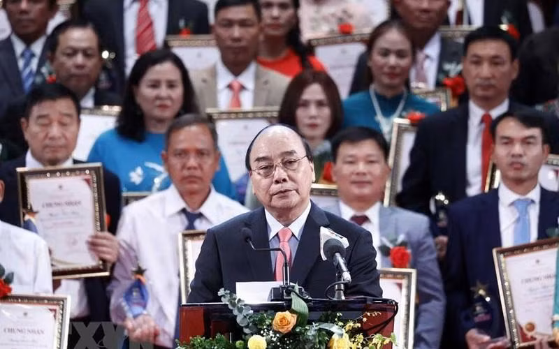 El presidente Nguyen Xuan Phuc habla en el evento. (Foto: VNA)