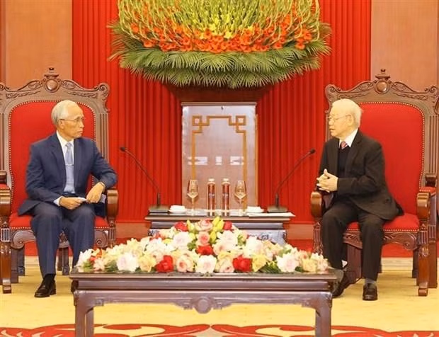 El secretario general del PCV, Nguyen Phu Trong, y Khamphan Pheuyavong, secretario del Comité Central del PPRL, jefe de su Comisión de Comunicación y Formación y presidente del Consejo Teórico Central (Fotografía:VNA)
