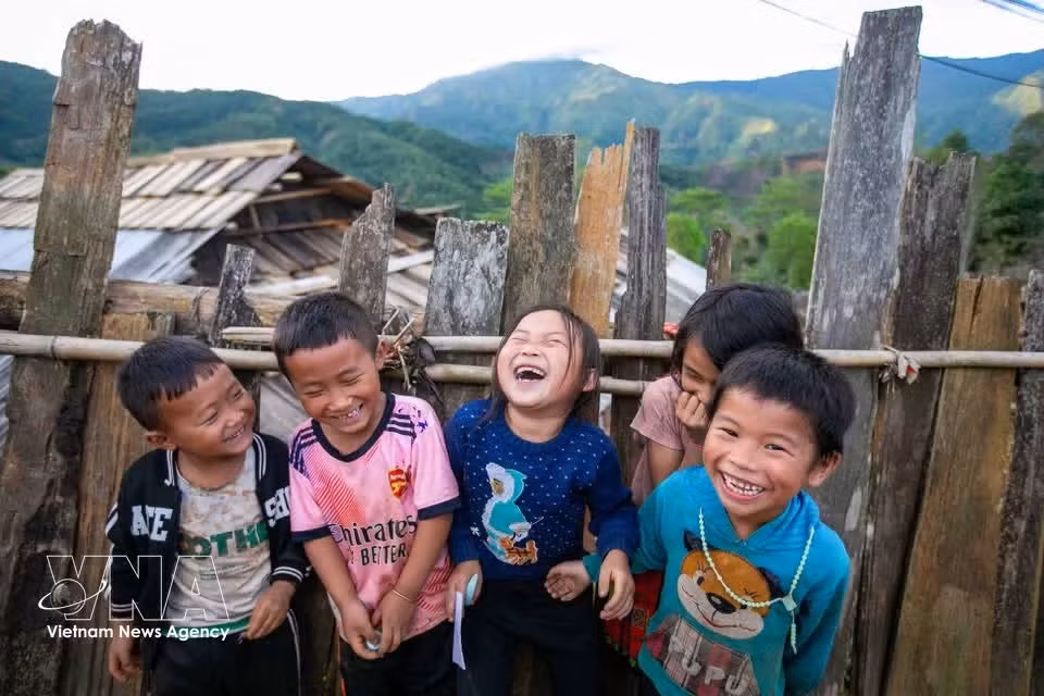 Sonrisas de los niños en Lang Sang.