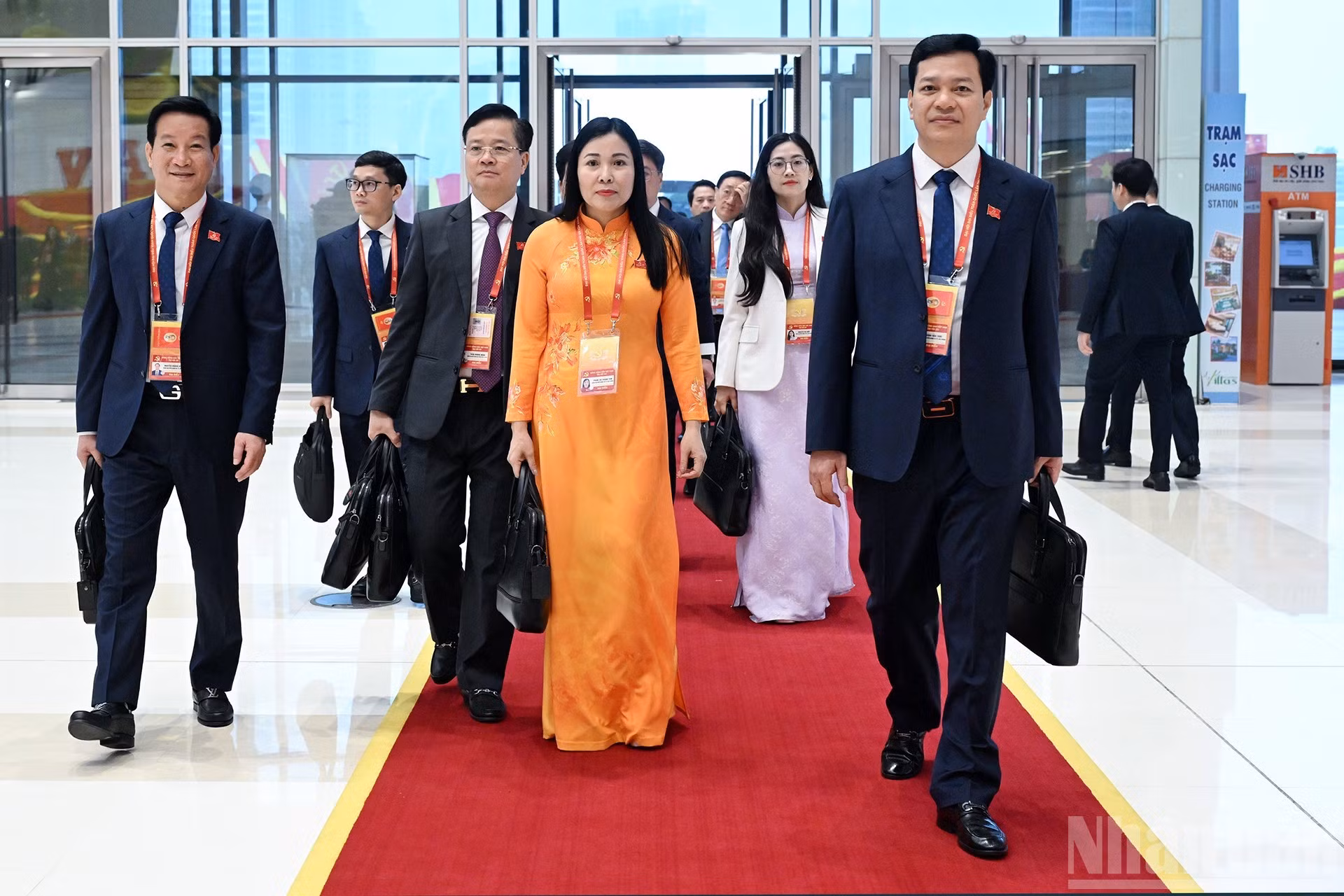 Delegados del XIV Congreso Nacional del Partido acuden al Centro Nacional de Convenciones.