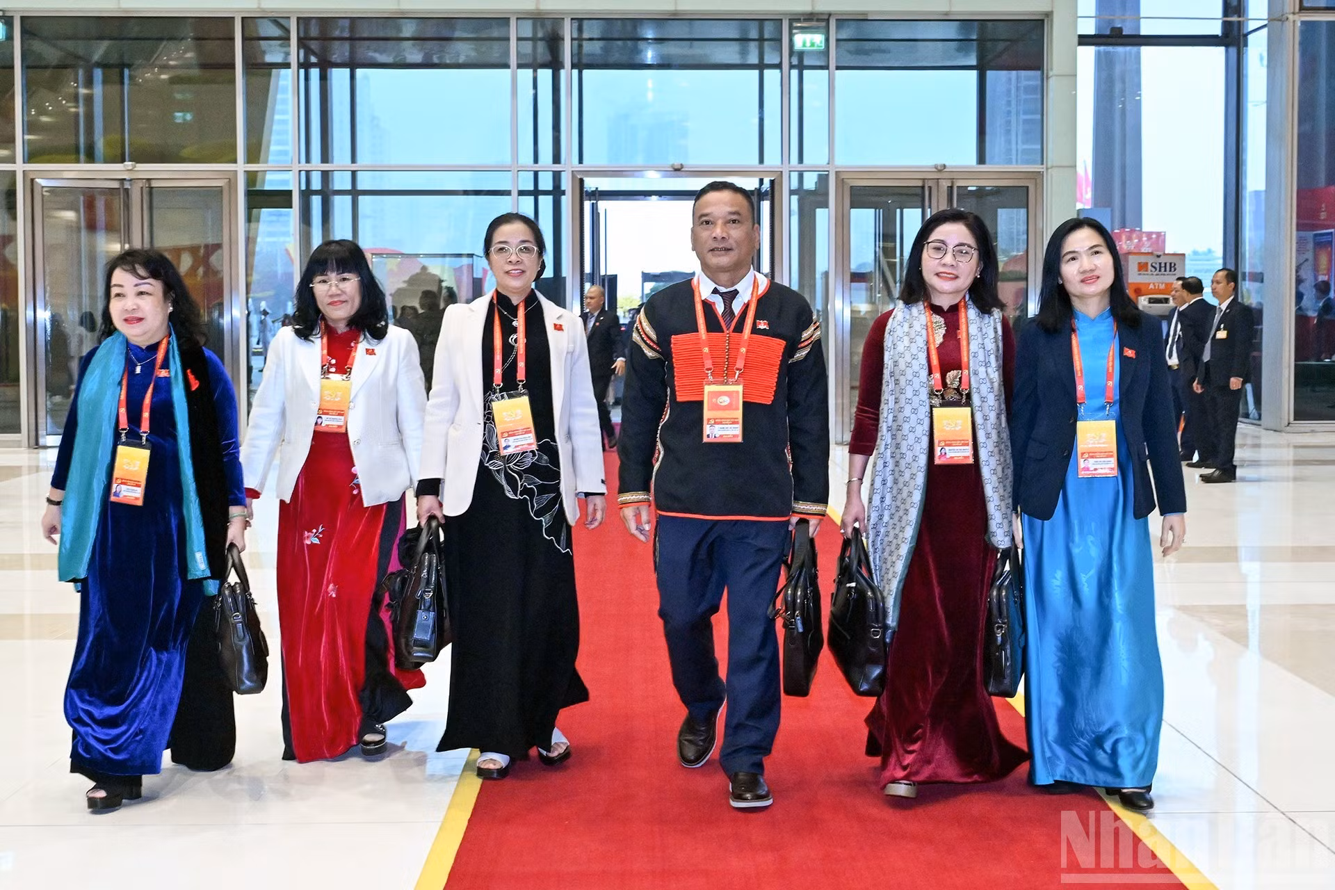 Delegados del XIV Congreso Nacional del Partido acuden al Centro Nacional de Convenciones.