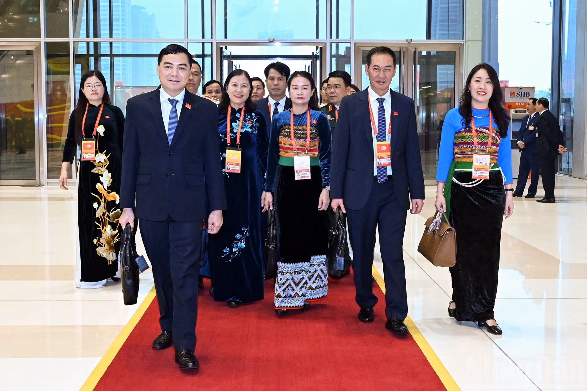 Delegados del XIV Congreso Nacional del Partido acuden al Centro Nacional de Convenciones.