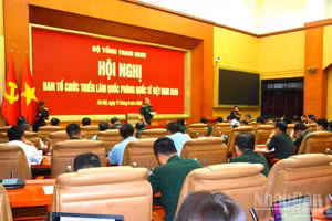 En la reunión del Comité Organizador del evento militar. (Foto: nhandan.vn)