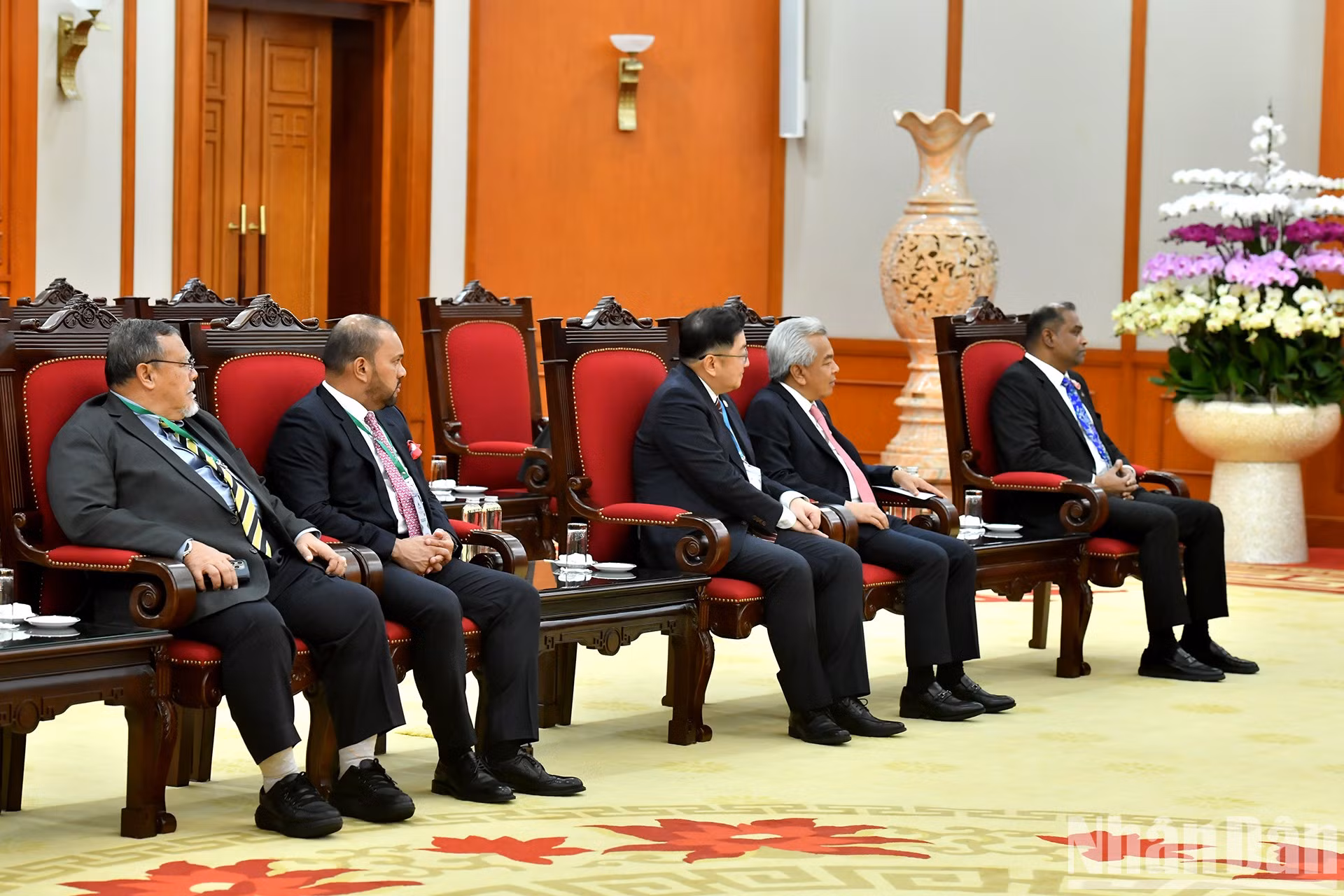 Delegados malasios en el encuentro.