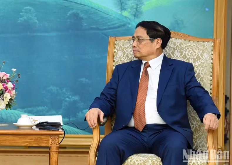 [Foto] Premier vietnamita recibe al enviado presidencial especial de EE.UU. para el Clima ảnh 3