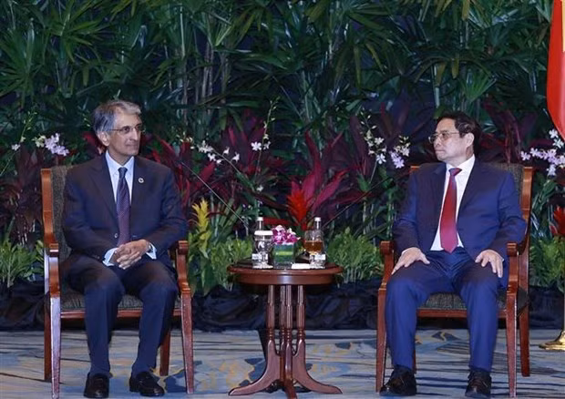 En la reunión con el director ejecutivo del grupo Temasek, Dilhan Pillay. (Fotografía: VNA) En la reunión con el director ejecutivo del grupo Temasek, Dilhan Pillay. (Fotografía: VNA)