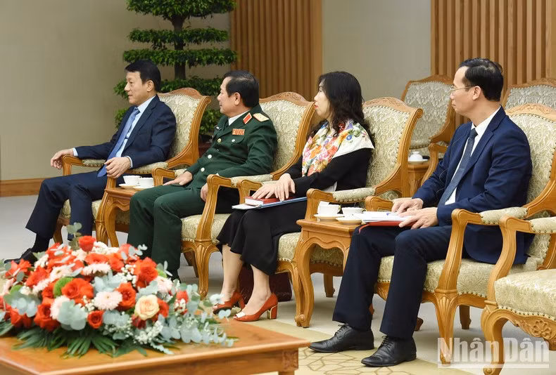 Delegados del Gobierno vietnamita.